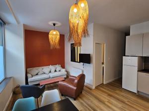 Appartements 4, 5 et 10 personnes renoves en centre-ville : photos des chambres