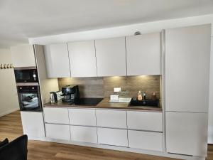 Appartements 4, 5 et 10 personnes renoves en centre-ville : photos des chambres