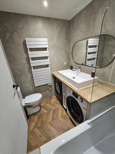 Appartements 4, 5 et 10 personnes renoves en centre-ville : photos des chambres