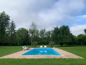 Appartements Appartement familial au bord de la Marne, jardin tropical , piscine, tennis, terrasse, parking gratuit proche Disneyland : photos des chambres