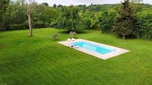 Appartements Appartement familial au bord de la Marne, jardin tropical , piscine, tennis, terrasse, parking gratuit proche Disneyland : photos des chambres