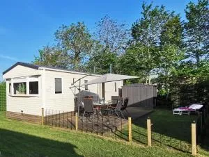 Stacaravan op 5 Sterren Vakantiepark De Kuilart Friesland aan het Meer met Zwembad 5P 116 - Wijckel