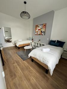 Appartements Le National Appartement centre-ville : photos des chambres