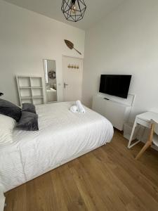 Appartements Le National Appartement centre-ville : photos des chambres