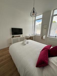 Appartements Le National Appartement centre-ville : photos des chambres