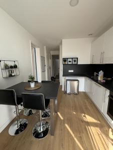 Appartements Le National Appartement centre-ville : photos des chambres