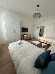 Appartements Le National Appartement centre-ville : photos des chambres