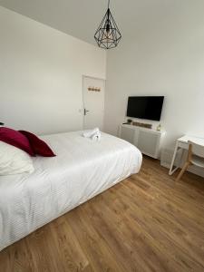Appartements Le National Appartement centre-ville : photos des chambres