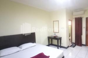 Hotel Palem 2 Syariah Malang Redpartner