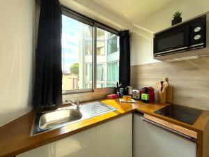 Les Entrepreneurs - Appartements neufs et spacieux, proche RER C et Aeroport Orly : photos des chambres