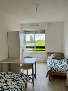 Appartements Le spacieux : photos des chambres