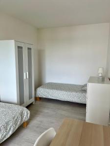Appartements Le spacieux : photos des chambres