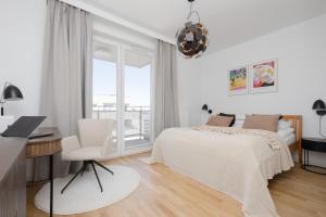 Luxury Three Bedroom Apartment with Parking & Balcony in Mokotów by Renters Prestige