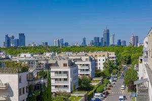 Luxury Three Bedroom Apartment with Parking & Balcony in Mokotów by Renters Prestige