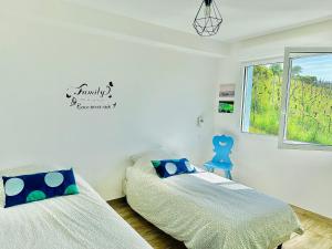 Appartements JANEA Big Blue House : photos des chambres