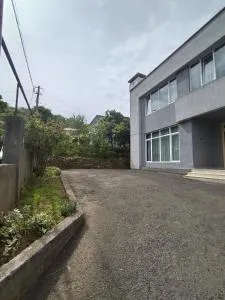 A house with a veranda - K'veda Sameba