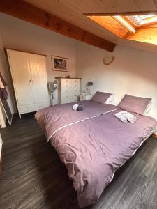 Appartements Jolie maison de vacances avec terrasse et jardin : photos des chambres