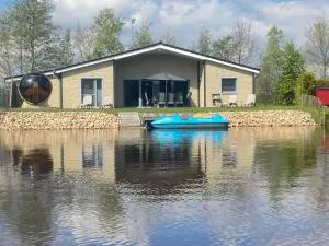 Ferienhaus am See mit Panorama Außensauna, hauseigenem Tretboot uvm. - Hoogstede