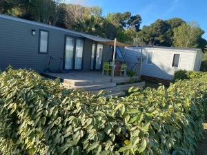 Maisons de vacances Bungalow cosy a Vendres avec piscine partagee : photos des chambres