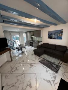 Appartements Maison de ville avec terrasse : photos des chambres