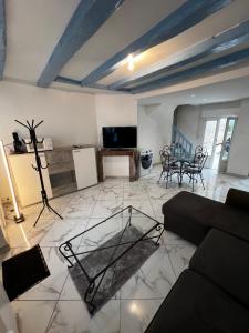 Appartements Maison de ville avec terrasse : photos des chambres