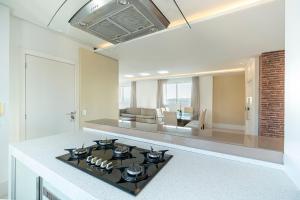 Elegance Tower 3 Suítes by Achei Camboriú