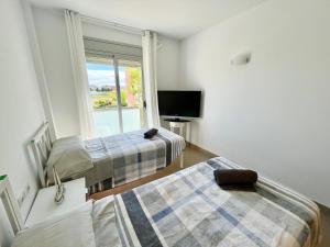 NEW! Apartamento con 2 piscinas, parque infantil, a 1 min de la playa