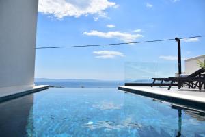 Spectacular villa X with heated pool overlooking Split and sea
