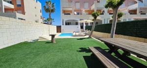 Homes of Spain, Apartamentos Paraíso Vera Playa, Fatu Hiva, Bajo A con piscina privada en jardín privado, PRIMERA LINEA de PLAYA, WIFI