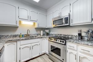 Dog-friendly, oceanfront condo with shared pool and beach access