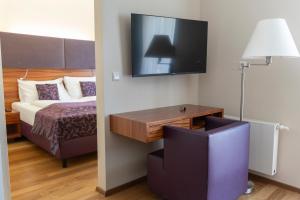 One-Bedroom Apartment with Balcony room in Pakat Suites Hotel