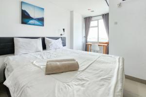 RedLiving Apartemen Enviro - Aurora Rooms