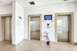 RedLiving Apartemen Enviro - Aurora Rooms