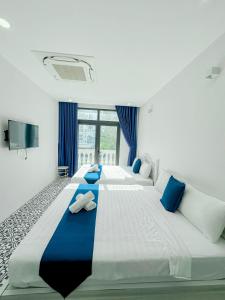 Beach Hotel Grand World (La La Homestay)