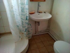 Appartements Ancien cafe des annees 30 : photos des chambres