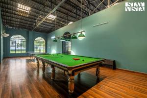 Arcadian Manor with Indoor Pool Indoor-Outdoor Games at Varanasi by StayVista
