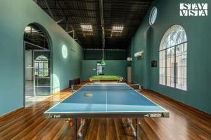 Arcadian Manor with Indoor Pool Indoor-Outdoor Games at Varanasi by StayVista
