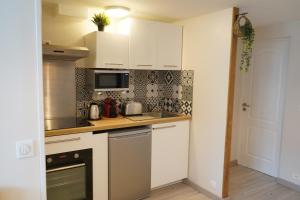 Appartements Villa Petite Fleur proche Paris CDG Disney Asterix et Parc des Expos : photos des chambres