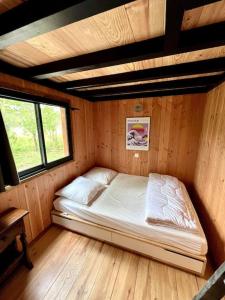 Campings Camping la Kahute - Tiny House au coeur de la foret : photos des chambres