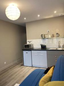 Appartements Les Volets bleus : photos des chambres