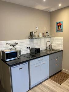 Appartements Les Volets bleus : photos des chambres