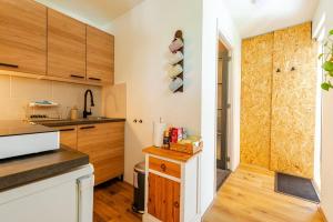 Tiny house - leenfietsen, eigen keuken en badkamer