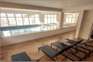 Apartamentos a 100m Praia das Toninhas PISCINA AQUECIDA