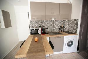 Appartements La Teranga - WIFI - Coeur de ville - Gare : photos des chambres