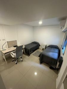 Departamento 2 habitaciones con cochera y cocina