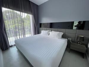 Utopia Naiharn by Fred&Com Phuket
