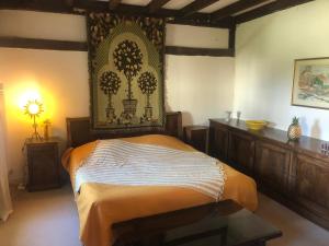Villas Maison ancienne avec piscine au milieu des vignes : photos des chambres