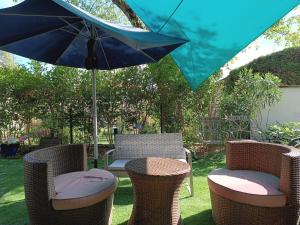 Sejours chez l'habitant Appartement entier Cozy Rdj Parking gratuit, proche tramway, stade OL, ARENA, Eurexpo, Aeroport StExupery, Gare TGV Lyon Partdieu : photos des chambres