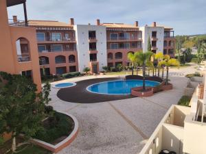 Spacious Vilamoura apartment with top terrace Barbeque with pool