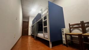 Bed in 4-Bed Mixed Dormitory Room room in Albergue La Estación